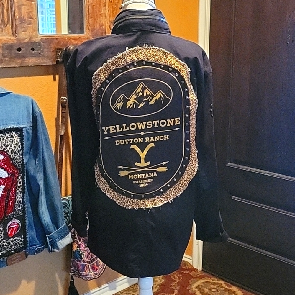 Black zip front jacket embellished with a Yellowstone Dutton Ranch Design